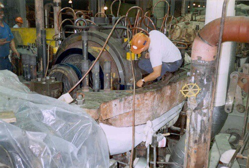 Technician Inspecting Turbine Closure System