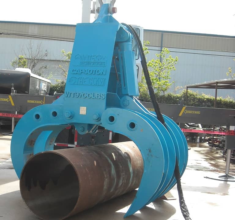 The Claw™ Grapple Picking Up Large Pipe